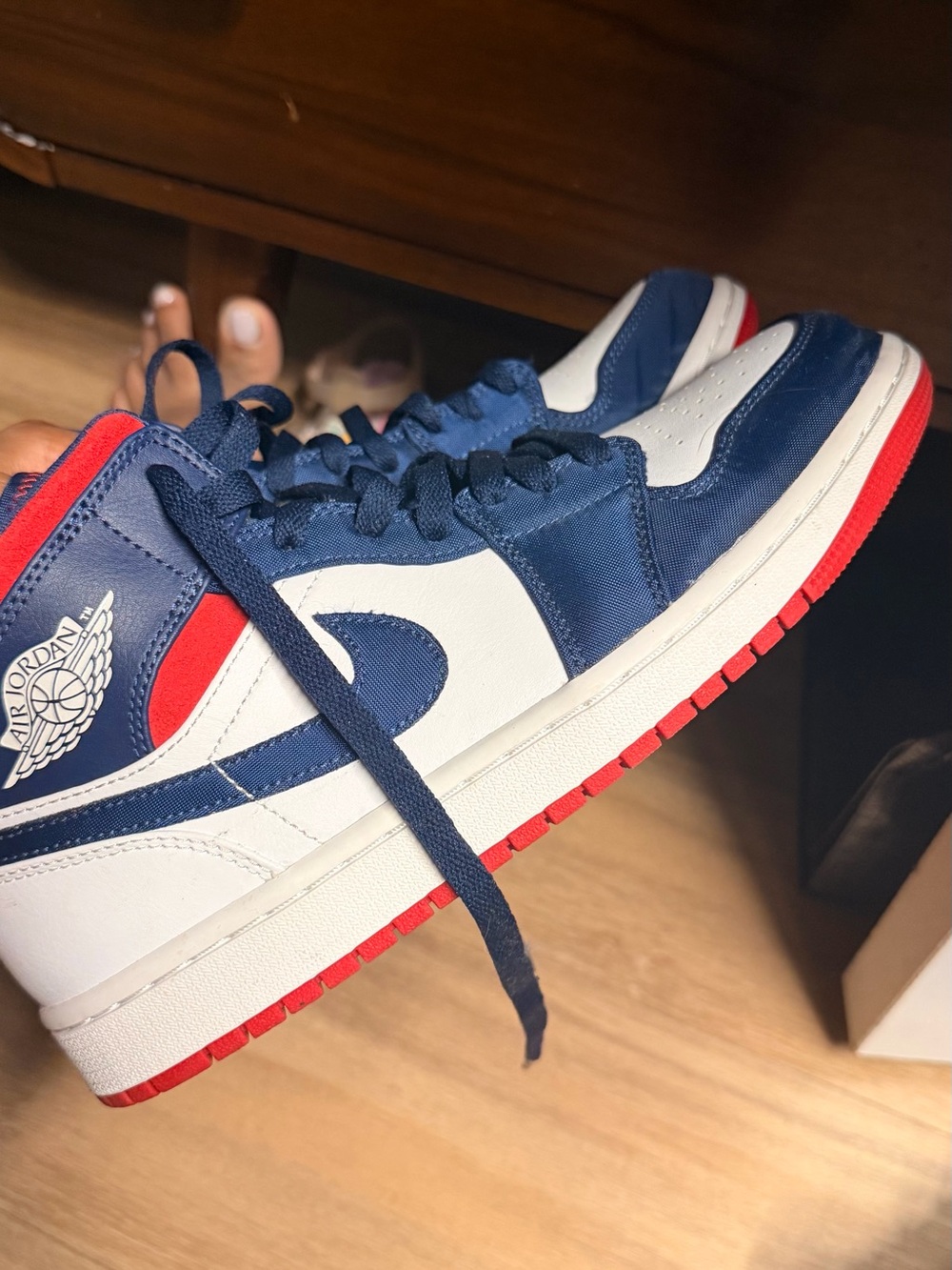 Nike Sneakers with Red Soles and Navy Accents
